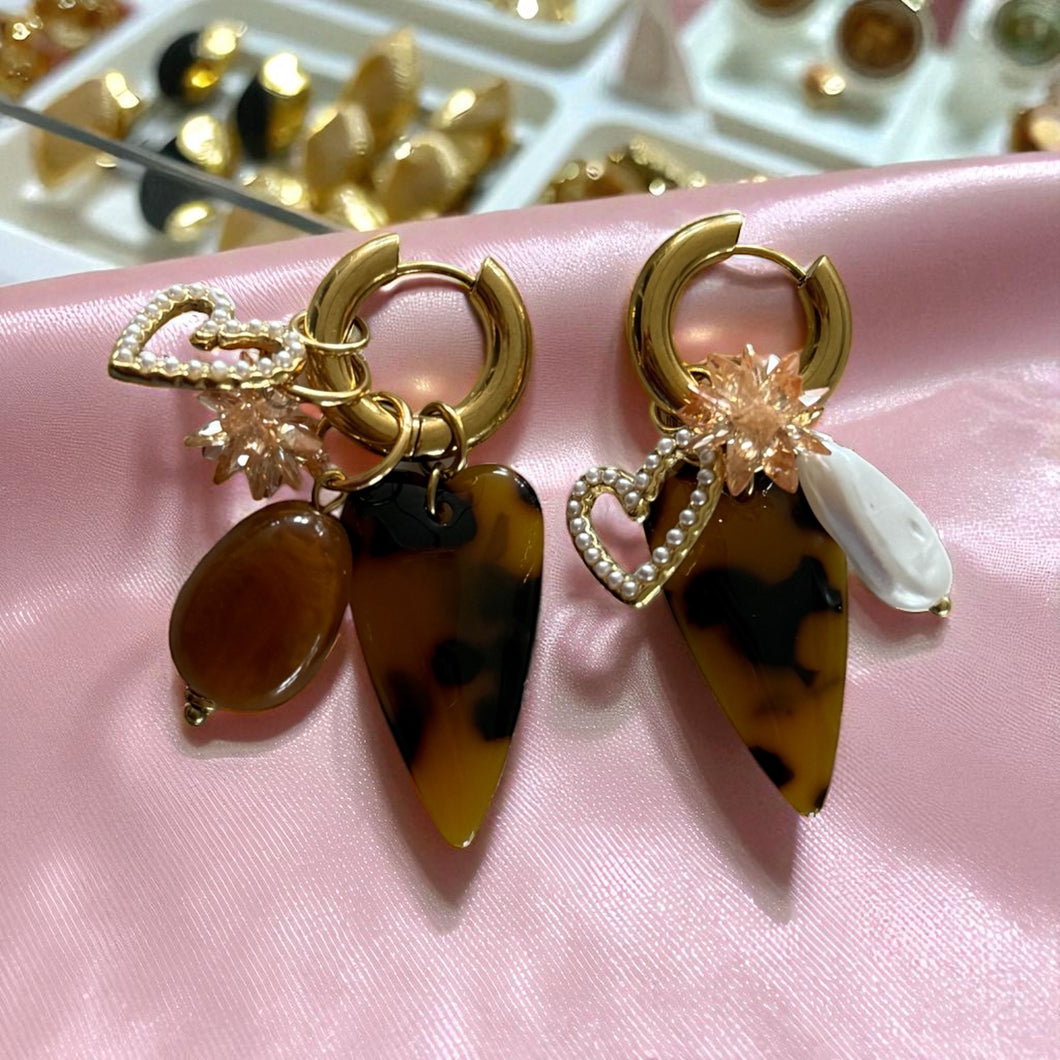 Oorbellen bruin power