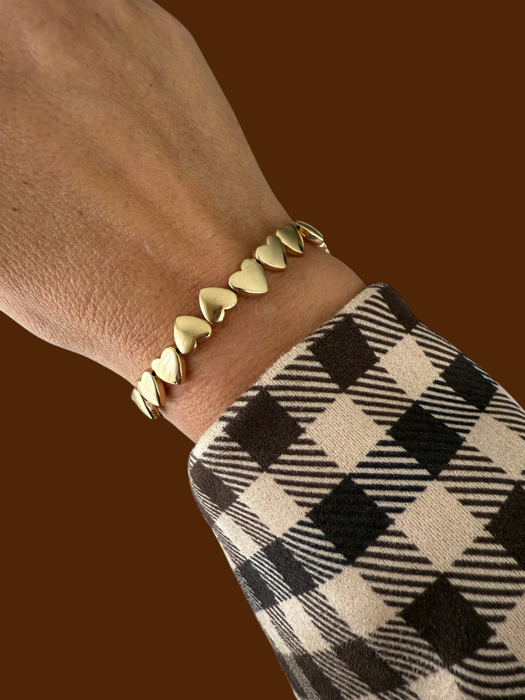 Armband hartjes om en om