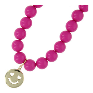 Ketting 16mm acryl kralen fuchsia met gouden smiley